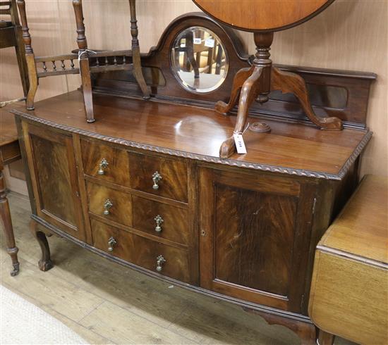 A 1920s mahogany bowfronted sideboard W.150cm